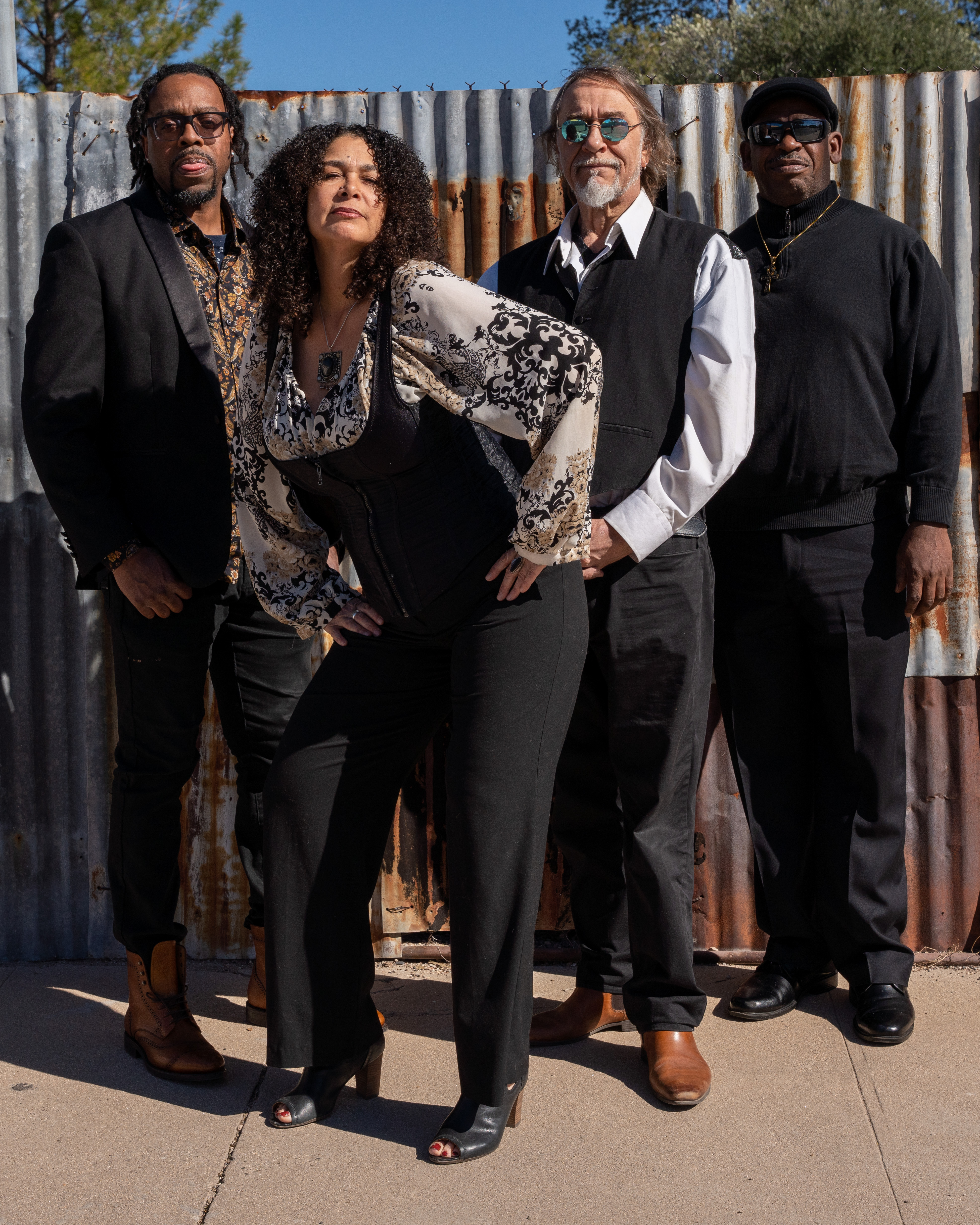 Group Shot at Metal Fencing