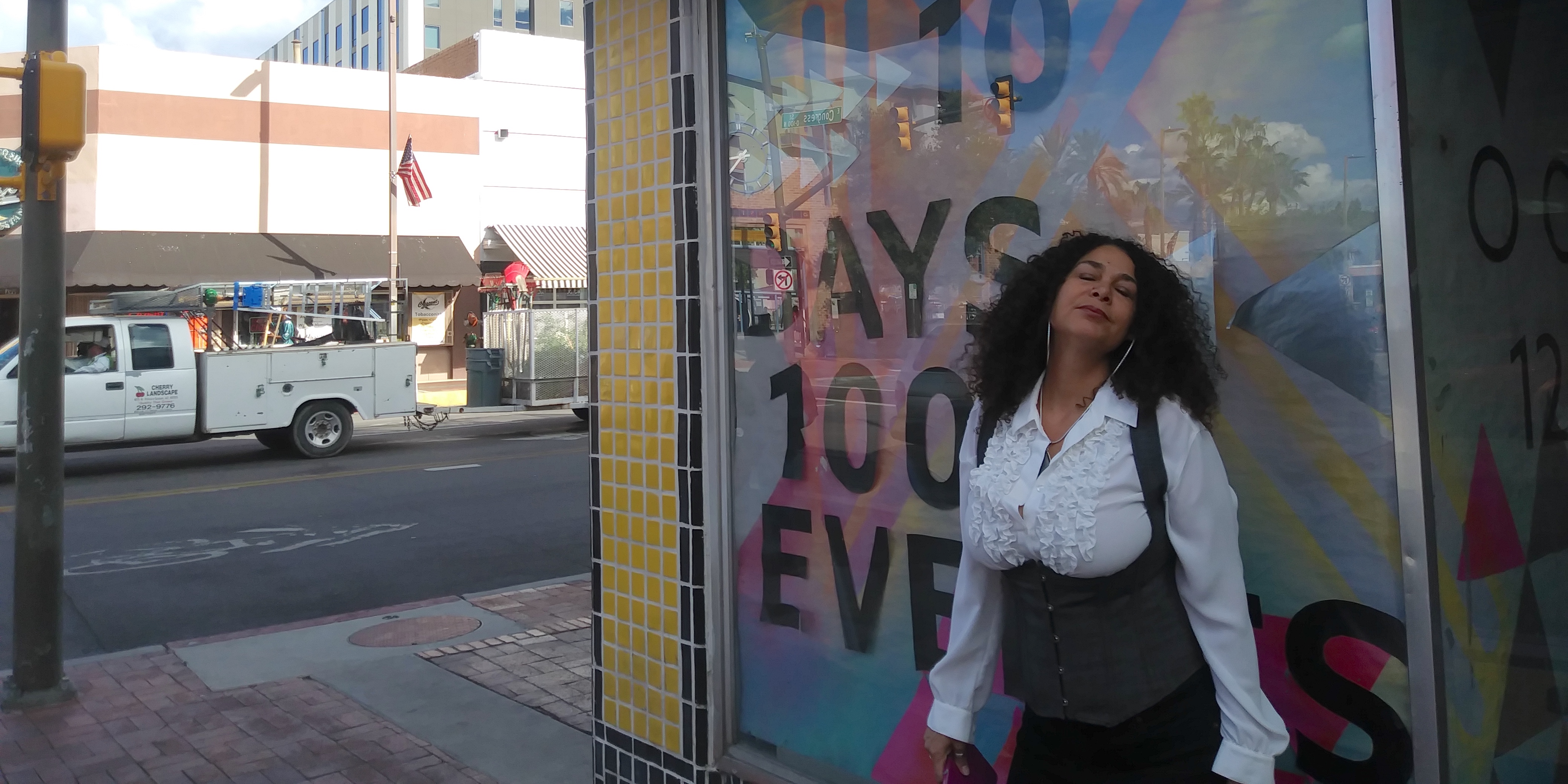 Amy outside by a music store